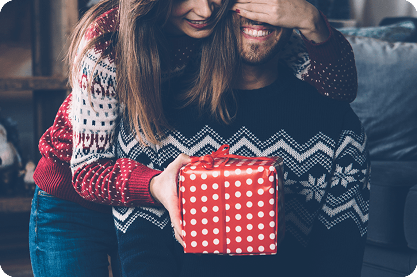 couple opening presents on christmas